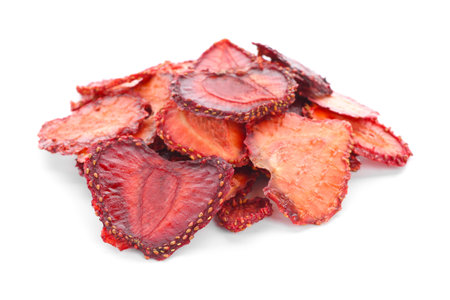 Tasty dried strawberries on white backgroundの写真素材