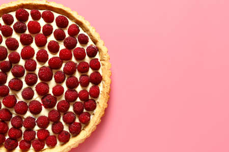 Tasty raspberry pie on color backgroundの写真素材
