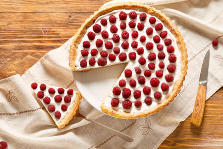 Tasty berry pie on table