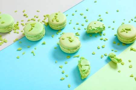 Tasty macarons on color backgroundの写真素材