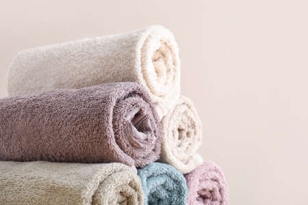 Soft clean towels on light backgroundの写真素材