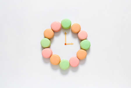 Creative composition with macarons on white backgroundの写真素材