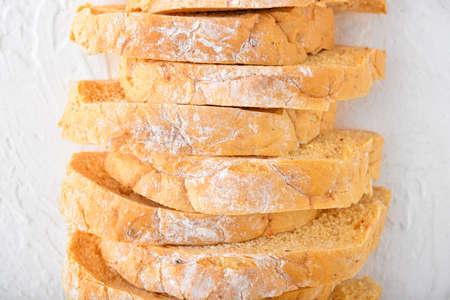 Sliced fresh bread on white background
