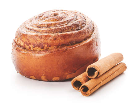 Tasty cinnamon bun on white backgroundの写真素材
