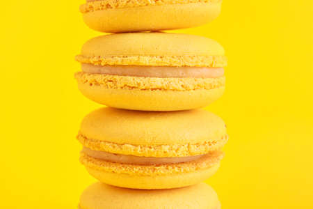 Tasty macarons on color background, closeupの写真素材