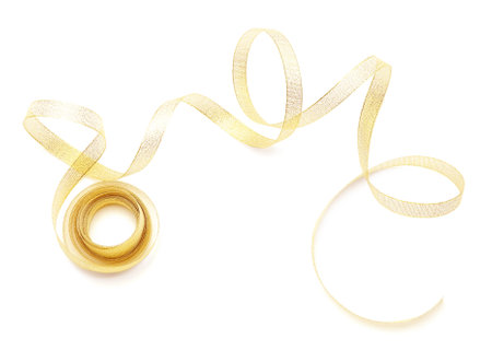 Beautiful golden ribbon on white backgroundの写真素材