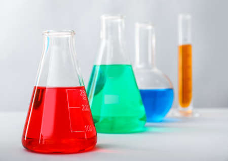 Flasks with colorful samples in laboratoryの写真素材