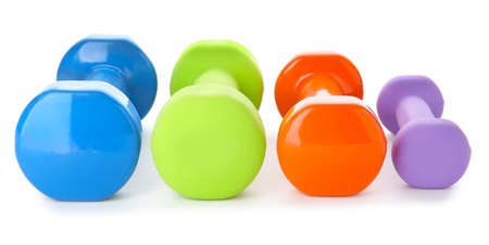Different dumbbells on white backgroundの写真素材