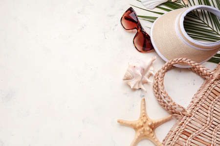 Composition with beach accessories on light backgroundの写真素材