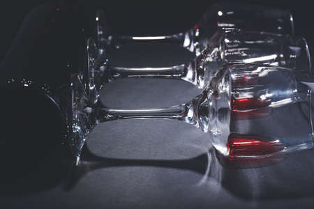 Wine glasses with bottle on dark backgroundの写真素材