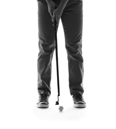 Handsome male golfer isolated on whiteの写真素材