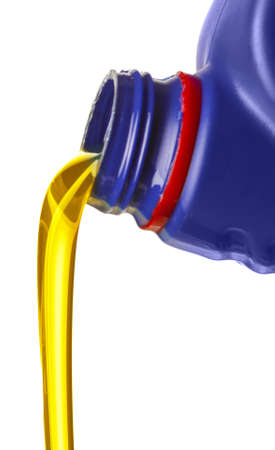 Can with pouring car oil on white background
