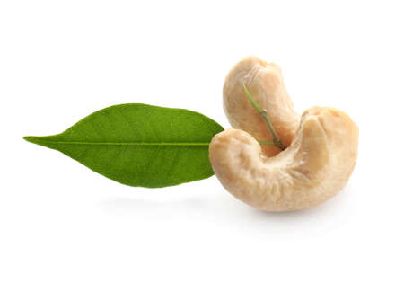 Tasty cashew nuts on white backgroundの写真素材