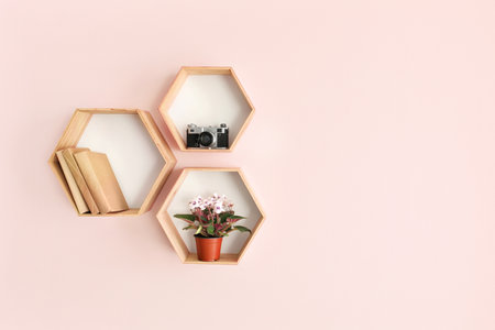 Modern shelves hanging on color wallの写真素材