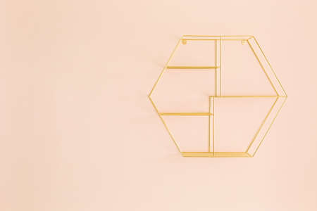 Modern shelf hanging on color wallの写真素材