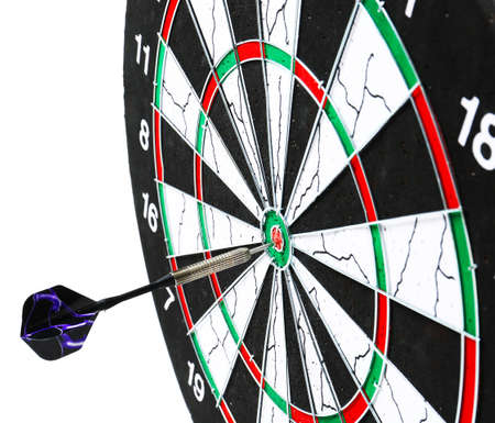 Dartboard with hit bullseye on white background, closeupの写真素材