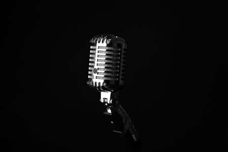 Retro microphone on dark backgroundの写真素材