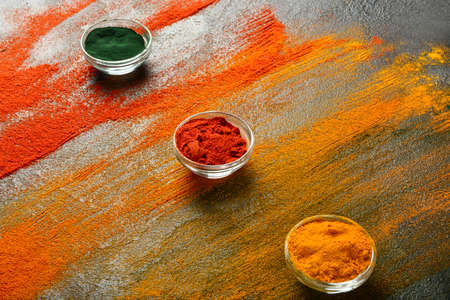 Bowls with different spices on dark backgroundの写真素材
