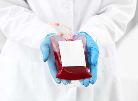 Female doctor with blood pack in hospital