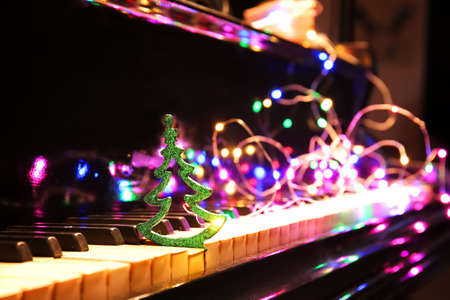 Piano with beautiful Christmas decor, closeupの写真素材