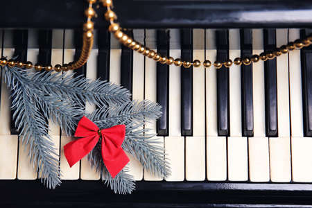 Piano with beautiful Christmas decor, closeupの写真素材