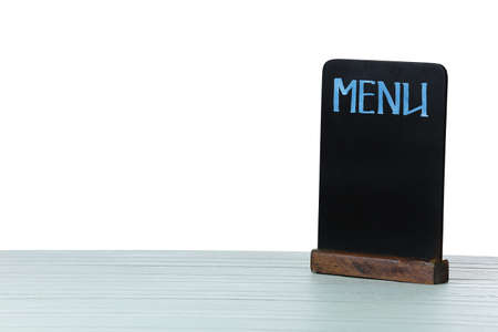 Blank menu on table against white backgroundの写真素材