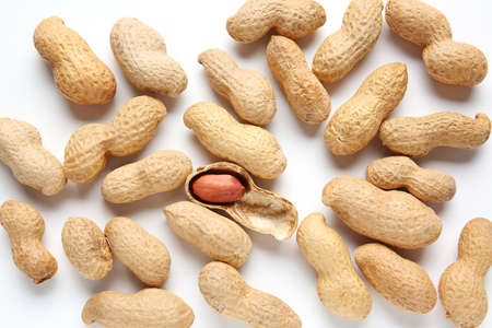 Tasty peanuts on white background