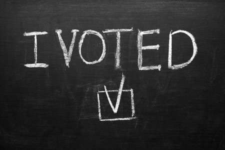 Text I VOTED on dark backgroundの写真素材