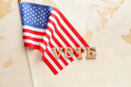 USA flag and text VOTE on light backgroundの写真素材