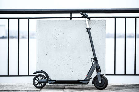 Modern electric kick scooter outdoorsの写真素材