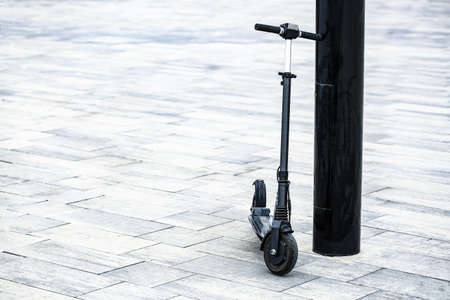 Modern electric kick scooter outdoorsの写真素材