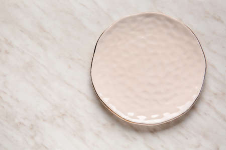 Empty plate on light backgroundの写真素材