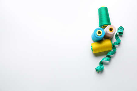Set of tailor's supplies on white background