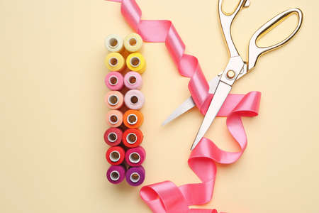 Set of tailor's supplies on color backgroundの写真素材