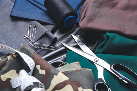 Set of tailor's supplies on fabricの写真素材