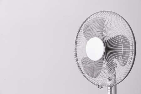 Electric fan on light backgroundの写真素材