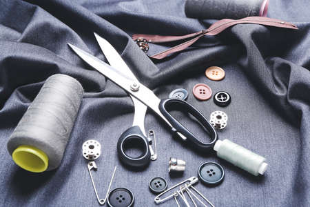 Set of tailor's supplies on fabricの写真素材