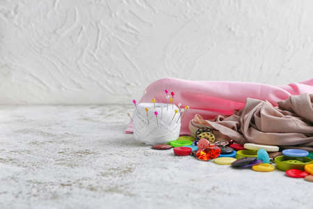 Set of tailor's supplies on white backgroundの写真素材