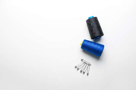 Set of tailor's supplies on white backgroundの写真素材