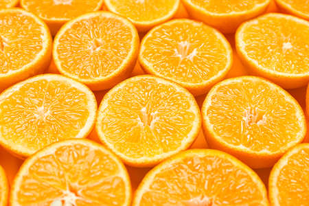 Ripe tasty tangerines as backgroundの写真素材