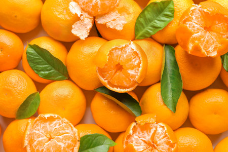 Ripe tasty tangerines as backgroundの写真素材