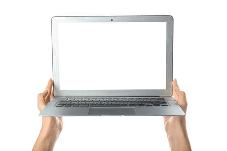 Female hands with modern laptop on white background