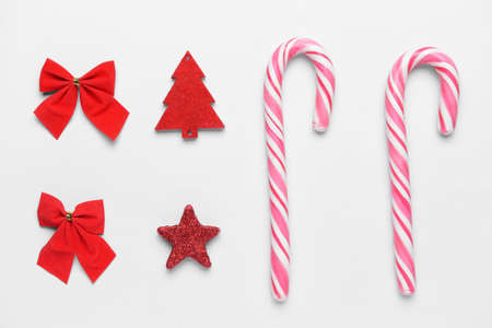 Beautiful Christmas composition with candy canes on white backgroundの写真素材