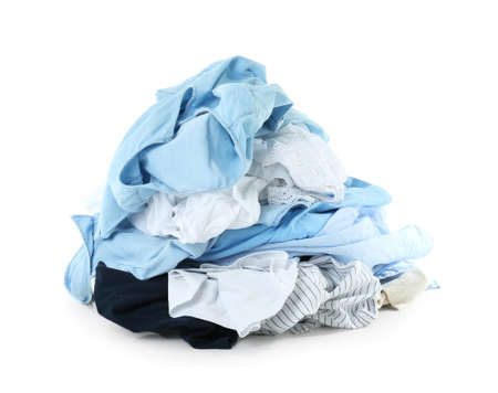 Heap of different clothes on white background