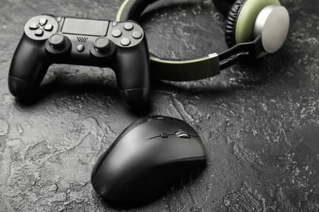 Modern gaming accessories on grunge background