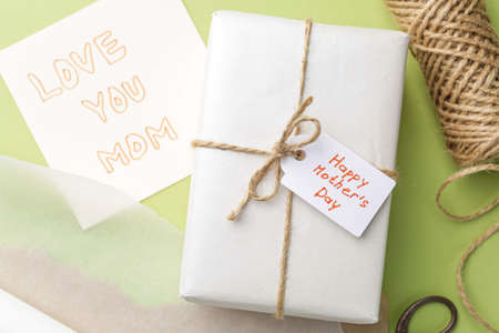 Gift for Mother's Day on color background