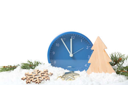 Clock, decor and snow on white background. Christmas countdown concept