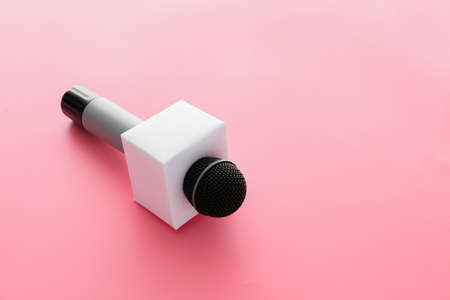 Journalist's microphone on color backgroundの写真素材