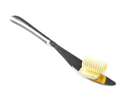 Knife with fresh butter on white backgroundの写真素材