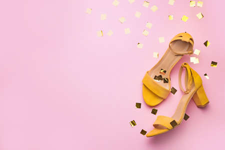 Stylish female shoes on color backgroundの写真素材